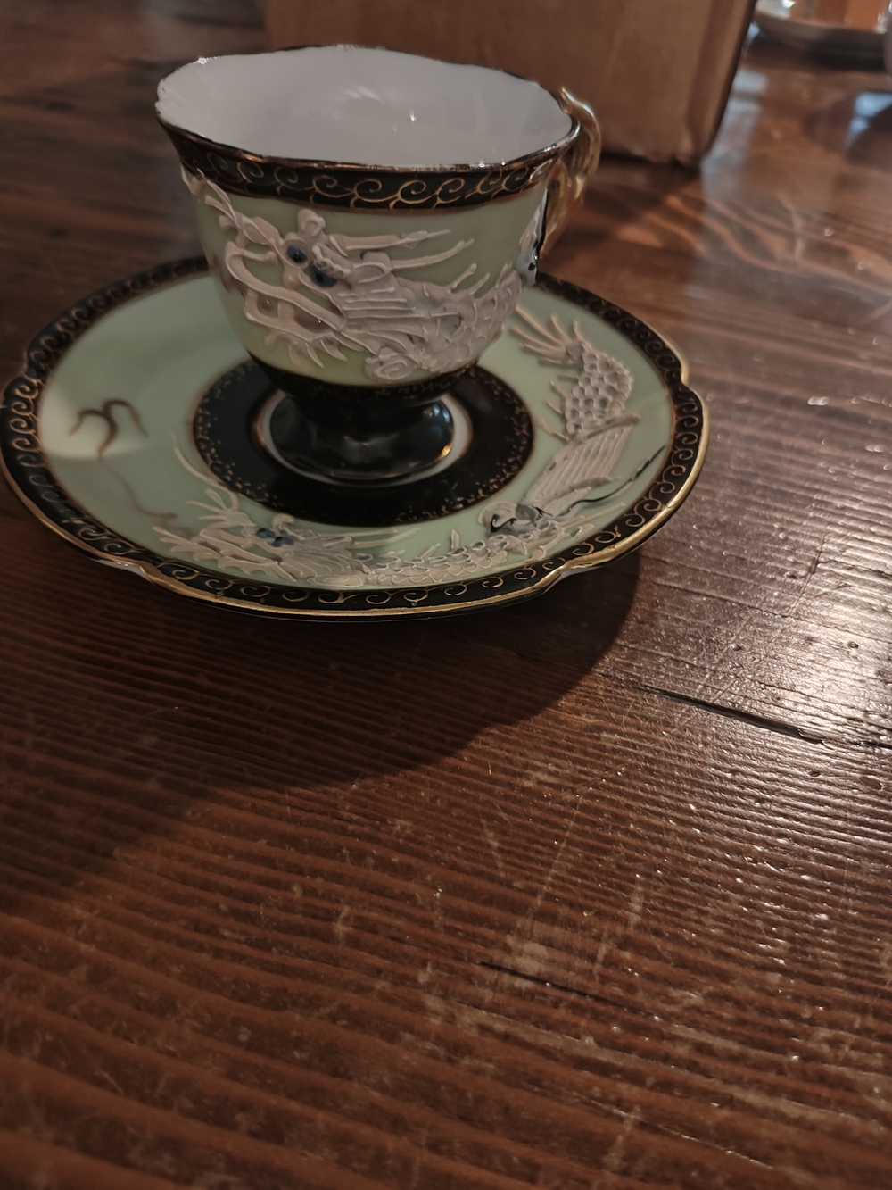 Decorative Green and Black Dragon Teacup with Saucer